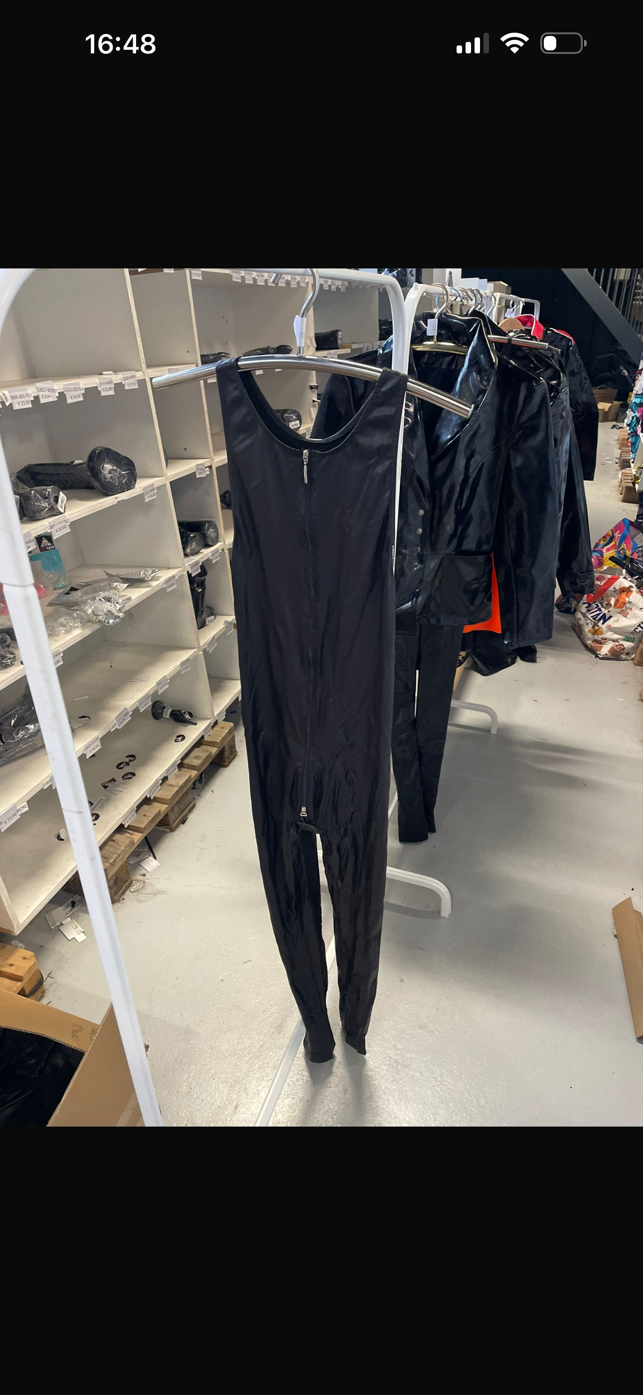 Zwarte Bodysuit met Rits en Open Armen – Maat M | FashionWorld