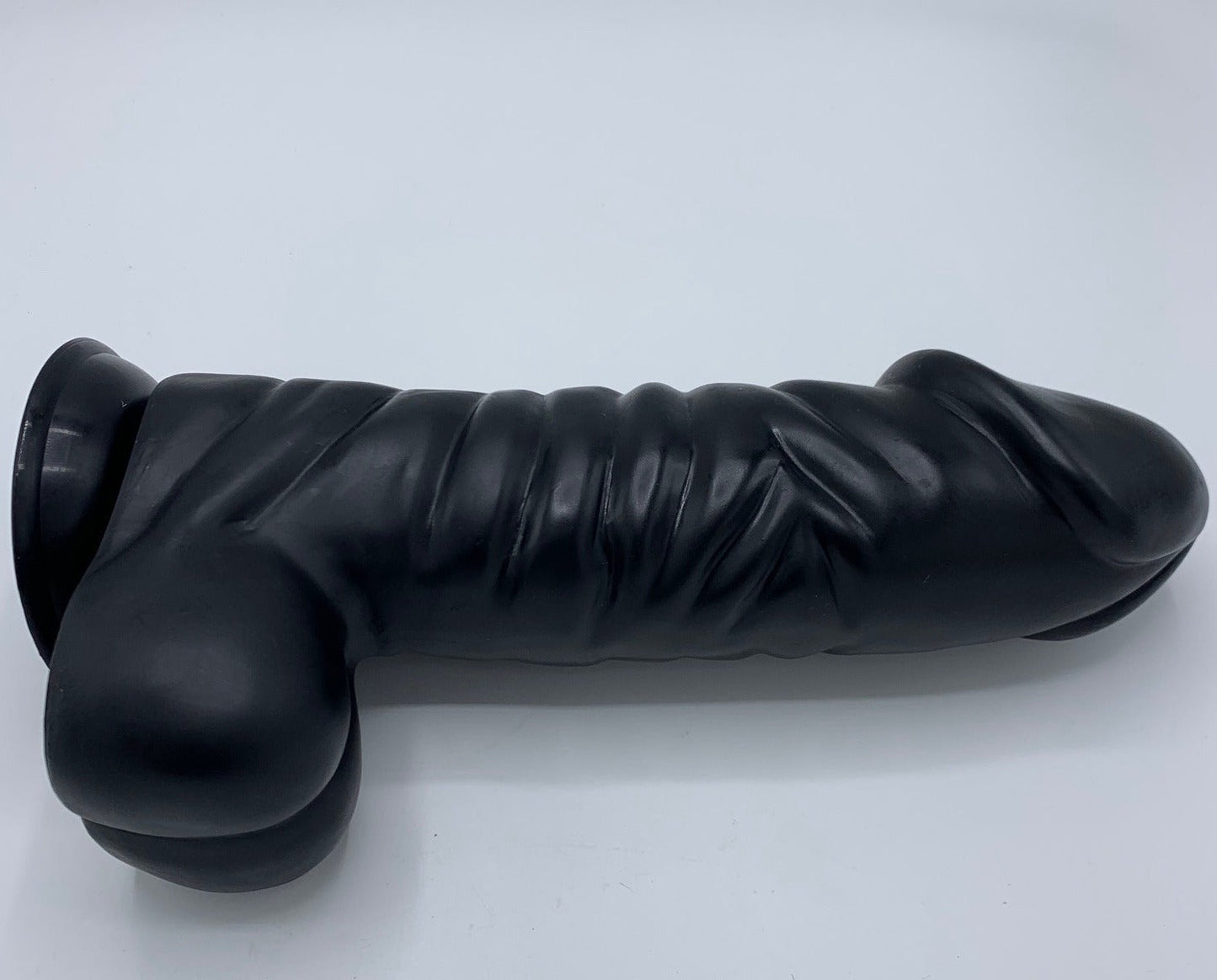 XXLTOYS Uncle Tom - XXL Realistic Dildo with huge balls - Insertable length 27 cm  x 7 cm  - Dia with balls 14 cm  - Length huge size 32 cm - Black